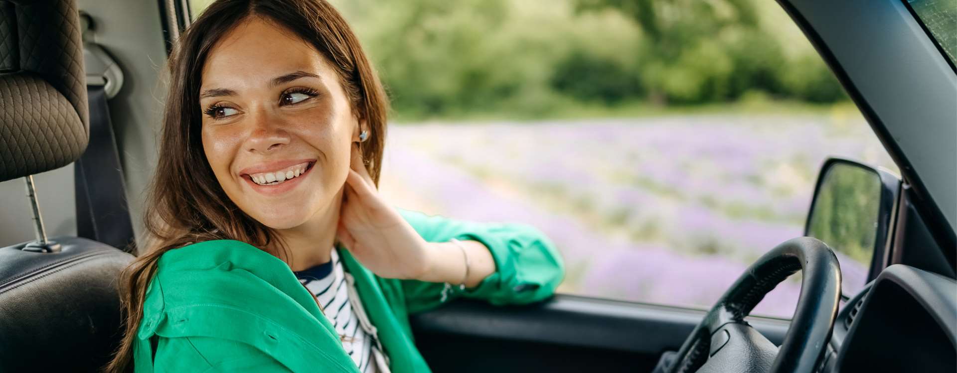 Woman looking at the back seat