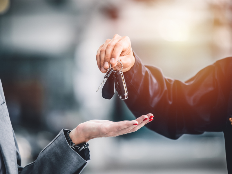 Customer receiving car keys