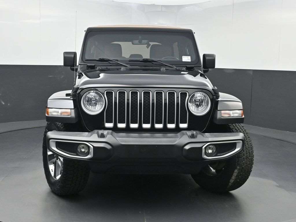 Front view of a used 2022 Jeep Wrangler Unlimited showing the seven-slot grille
