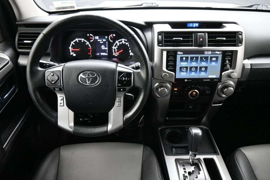 Dashboard and cockpit of a used 2023 Toyota 4Runner with an 8-inch touchscreen