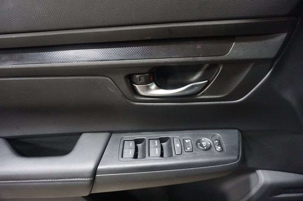 Interior cabin and dashboard of a used 2024 Honda CR-V at Driver's Way