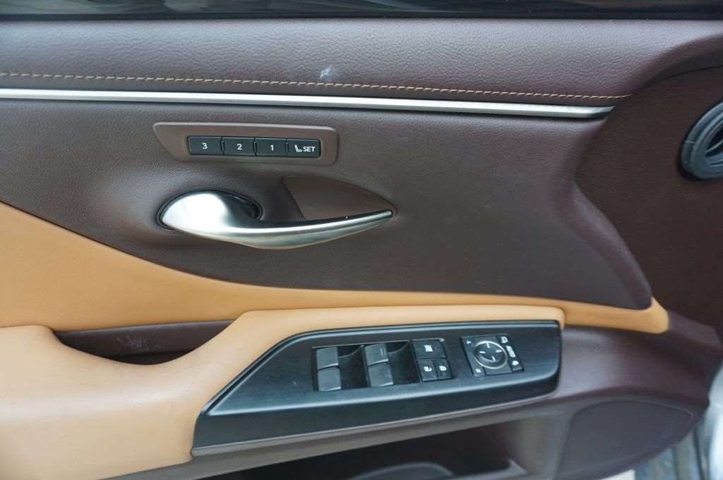 Interior door panel and controls of a used Lexus ES 350 at Driver's Way near Inverness, AL
