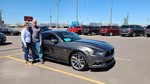 HAPPY OWNERS FROM MINNESOTA WITH THEIR NEW MUSTANG