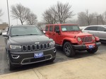 Out with the Grand Cherokee, In with the Wrangler! Awesome purchase for a young couple! 