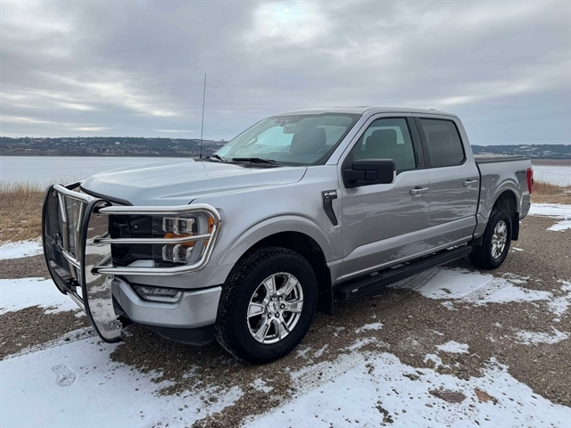 Used 2021 Ford F-150 XLT with VIN 1FTFW1E80MFA60733 for sale in Oacoma, SD