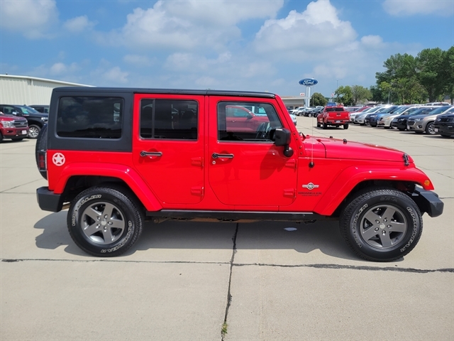 Used 2015 Jeep Wrangler Unlimited Sport with VIN 1C4BJWDGXFL636965 for sale in Vermillion, SD
