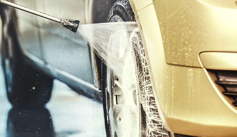 Hosing down car
