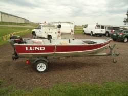 1993 LUND 14 FOOT ALUMINUM FISHING BOAT.
